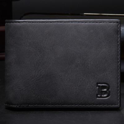 a black wallet with a letter on it