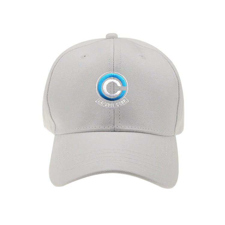 a grey hat with a blue circle on it