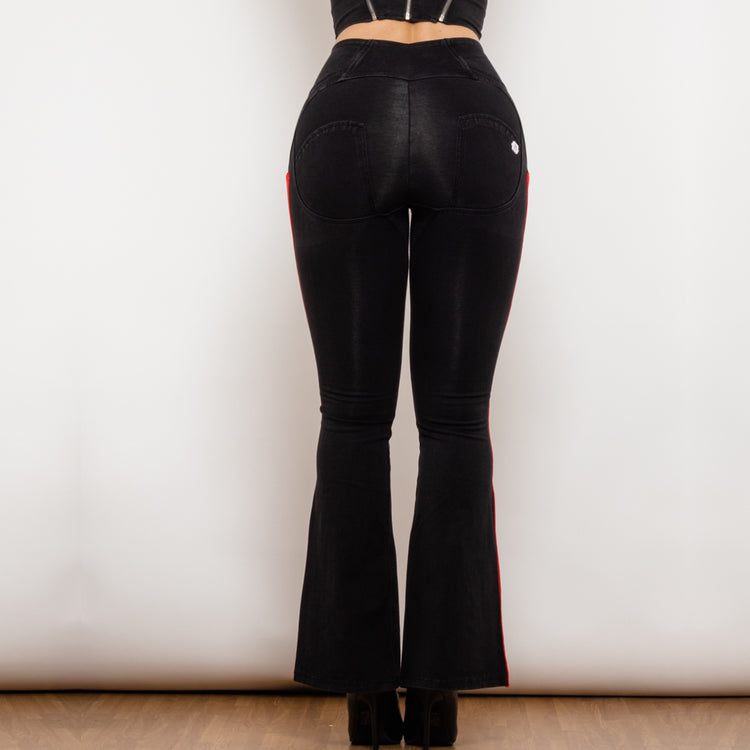 a woman wearing black pants