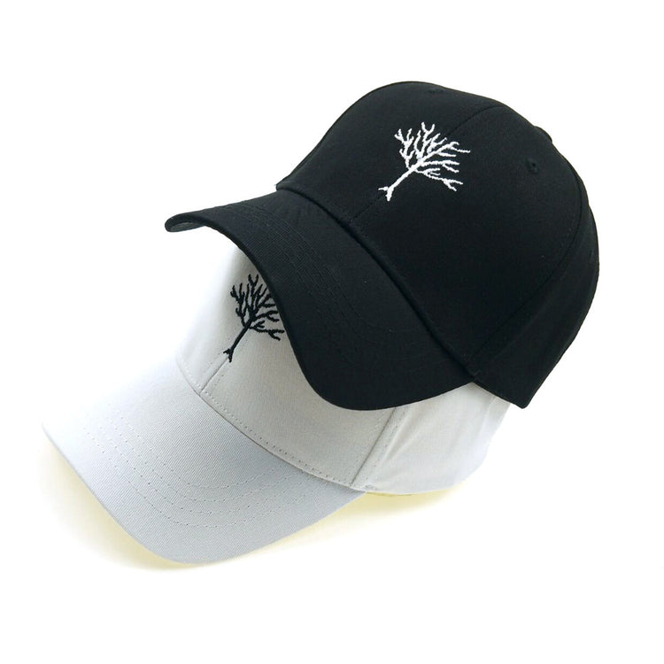 a pair of hats with trees on them