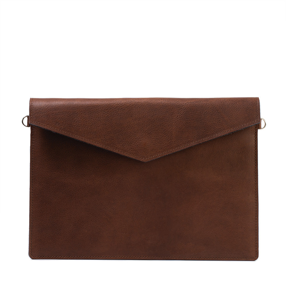 a brown leather envelope with a gold chain
