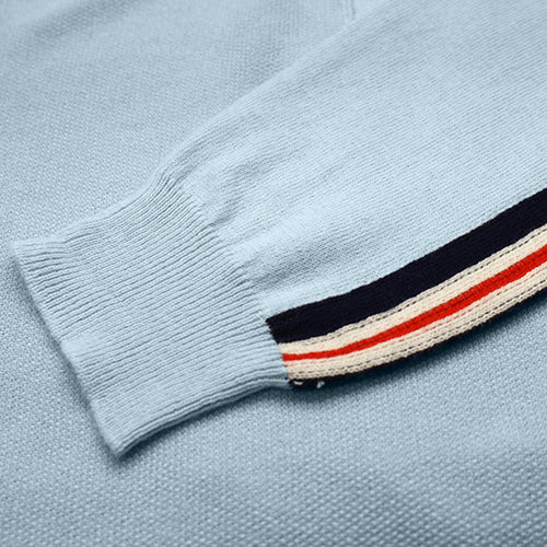 a close up of a sweater sleeve