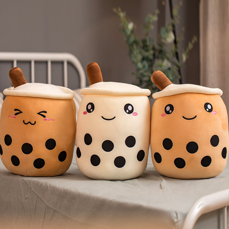 a group of soft toys on a table