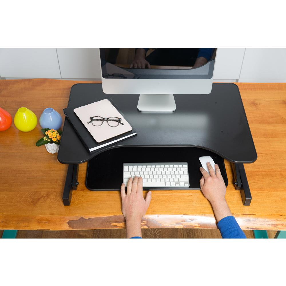 a person typing on a keyboard