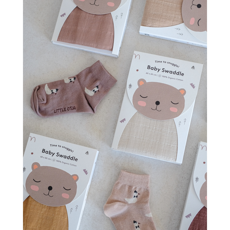 a group of baby socks and socks