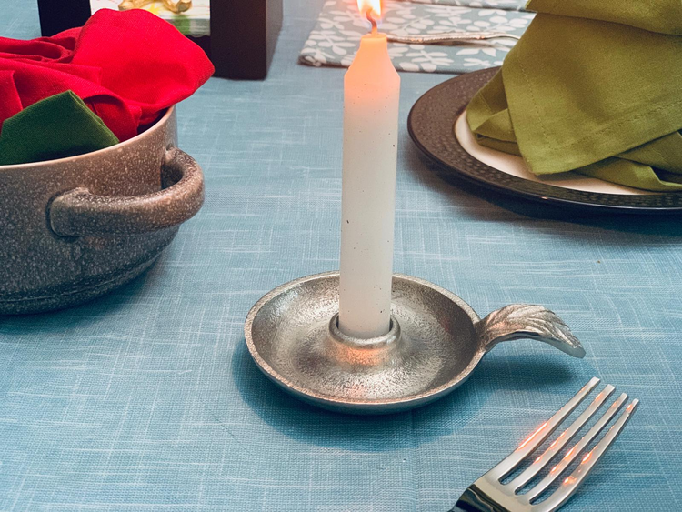 a candle in a candle holder