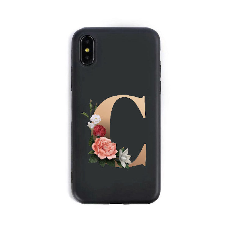 a black phone case with a letter on it