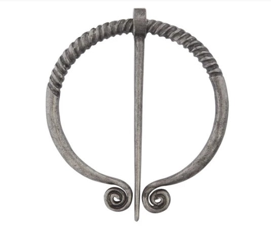 a metal pin with spirals