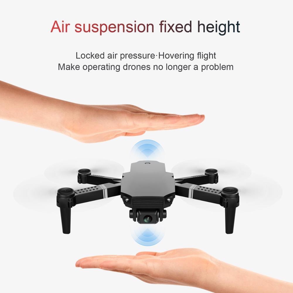 hands holding a drone