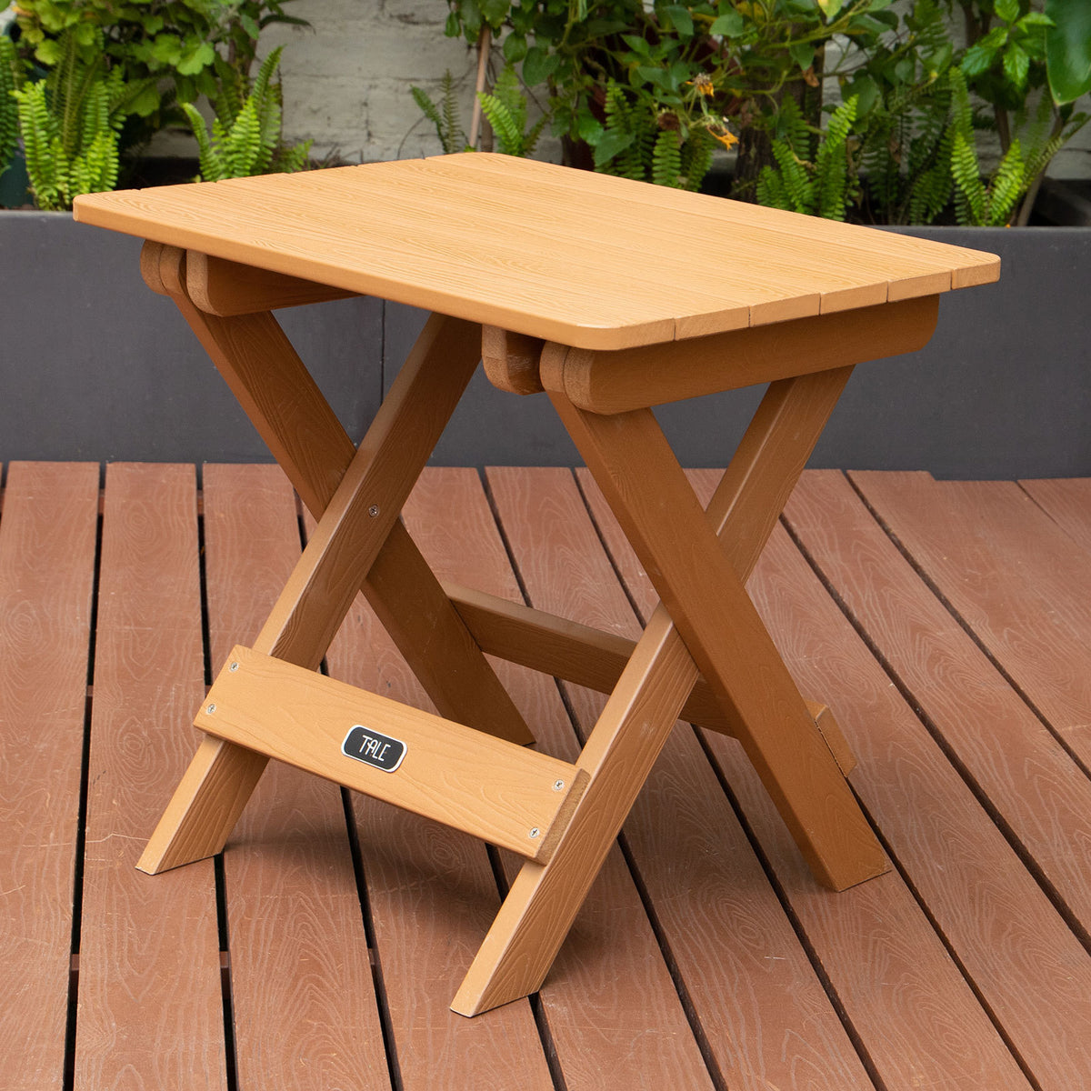 a wooden table on a deck
