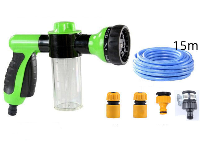 a green and black water gun