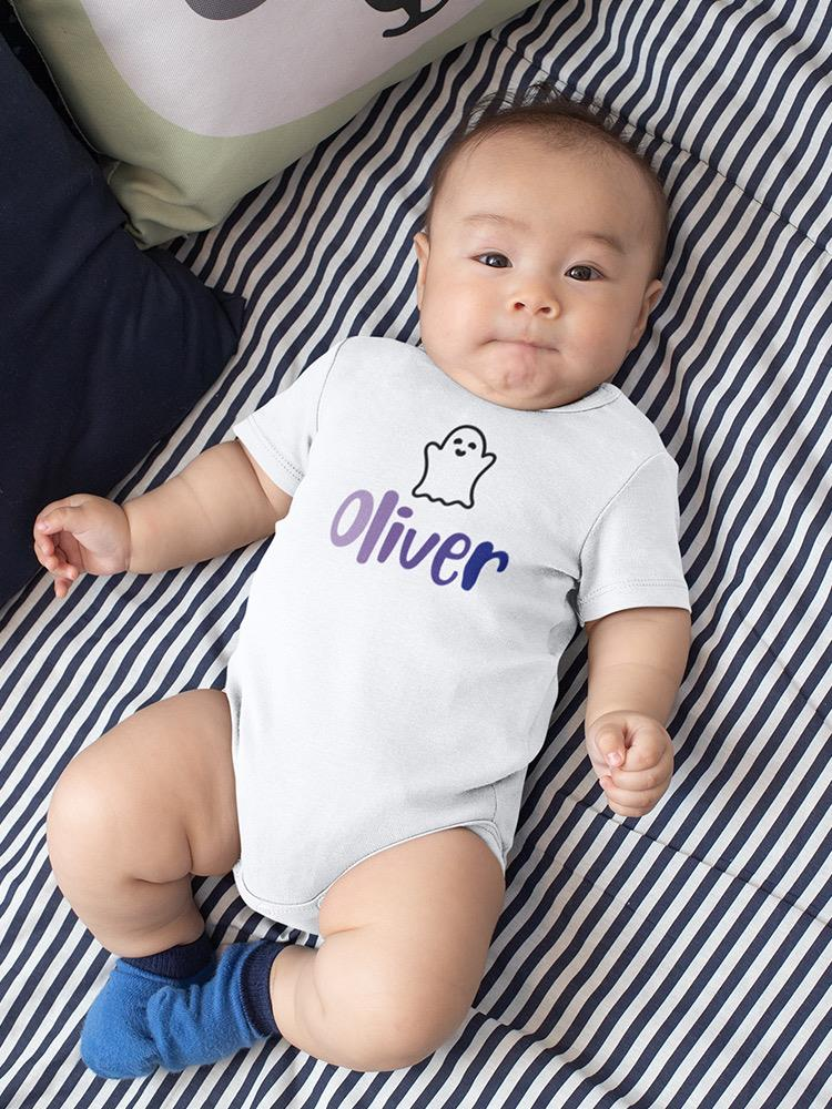 a baby lying on a striped surface