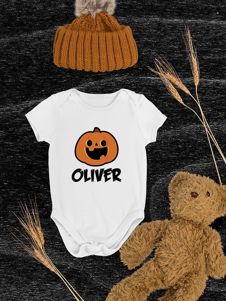 a baby clothes and a teddy bear