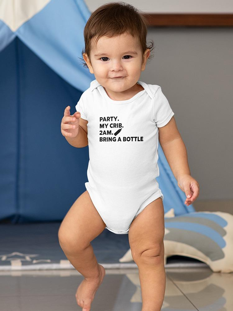 a baby standing in front of a blue tent