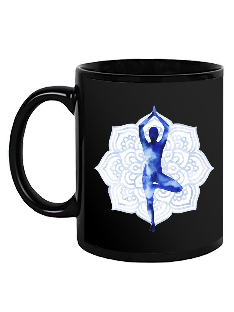 a black mug with a person in the yoga pose