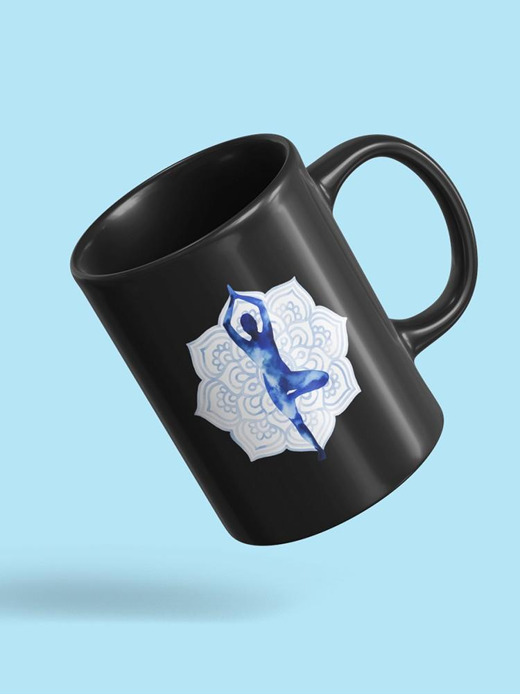 a black coffee mug with a picture of a person in the yoga pose