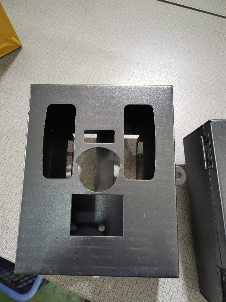 a metal box with holes