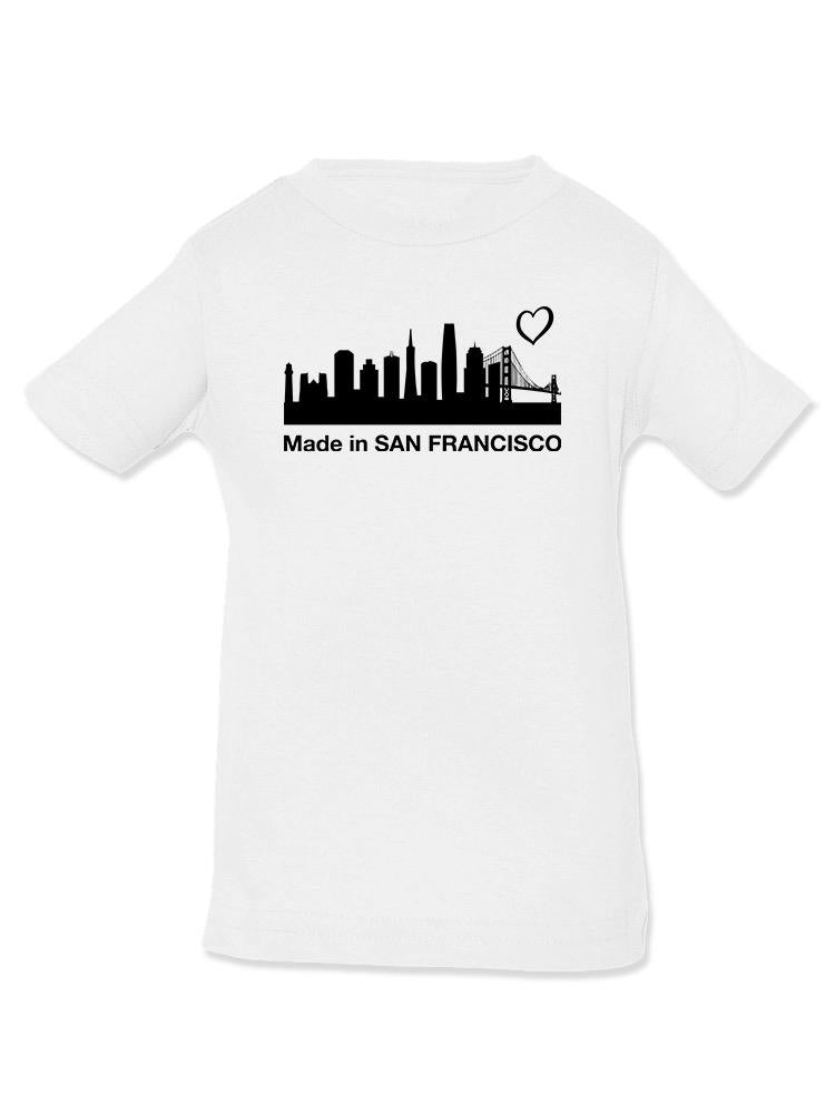 a white shirt with a city skyline and a heart