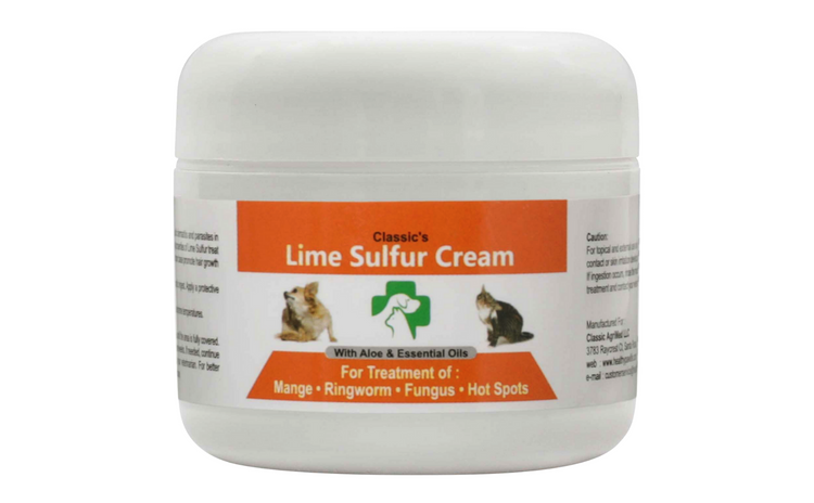 a white container with orange label