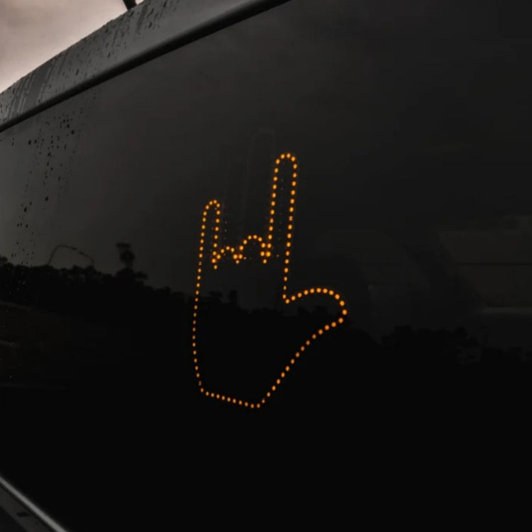 a hand drawn on a car window