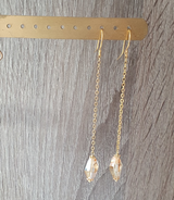 Gold dangle earrings with golden shadow crystals