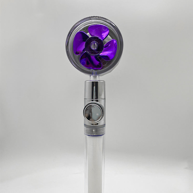 a purple fan with a silver handle