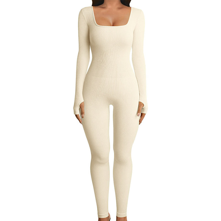 a woman in a white jumpsuit