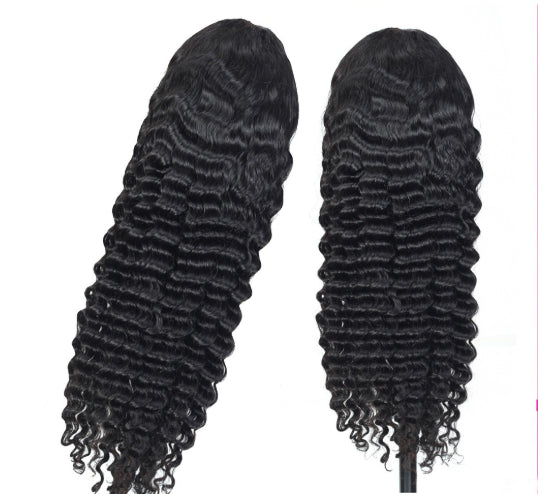 a pair of black wigs