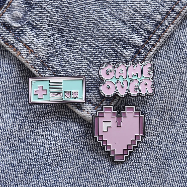 a group of pins on a jean