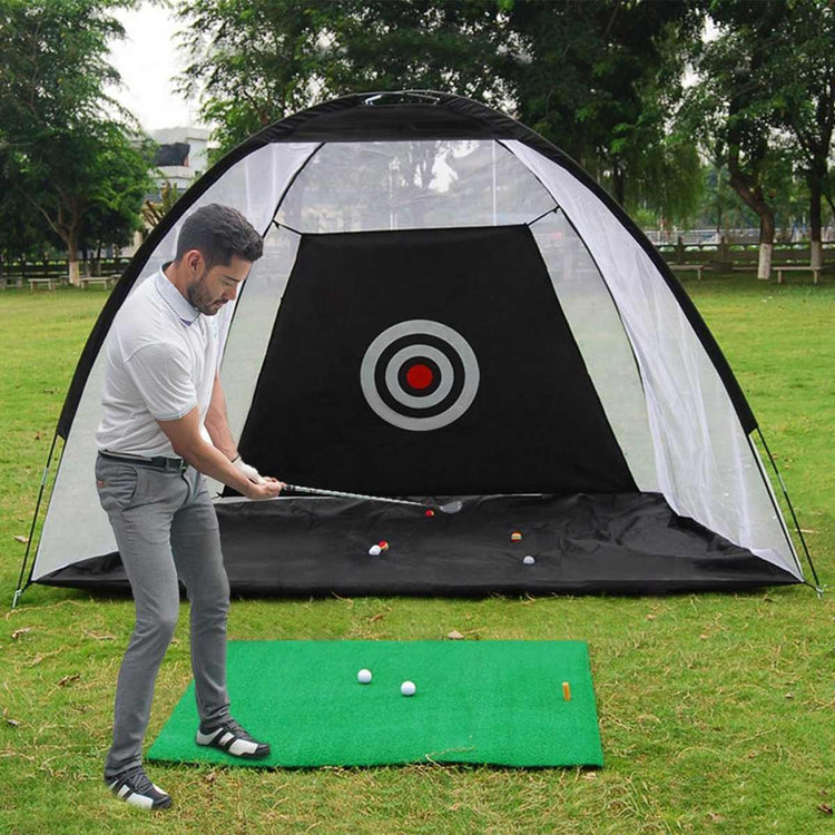 a man playing golf in a tent