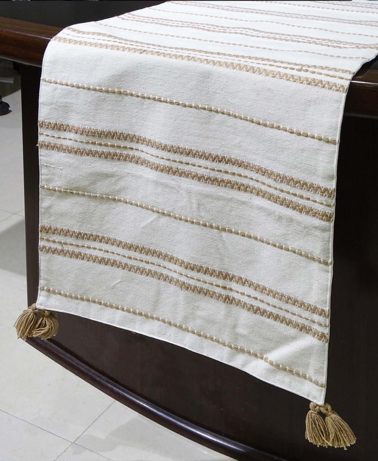 a white and brown striped towel