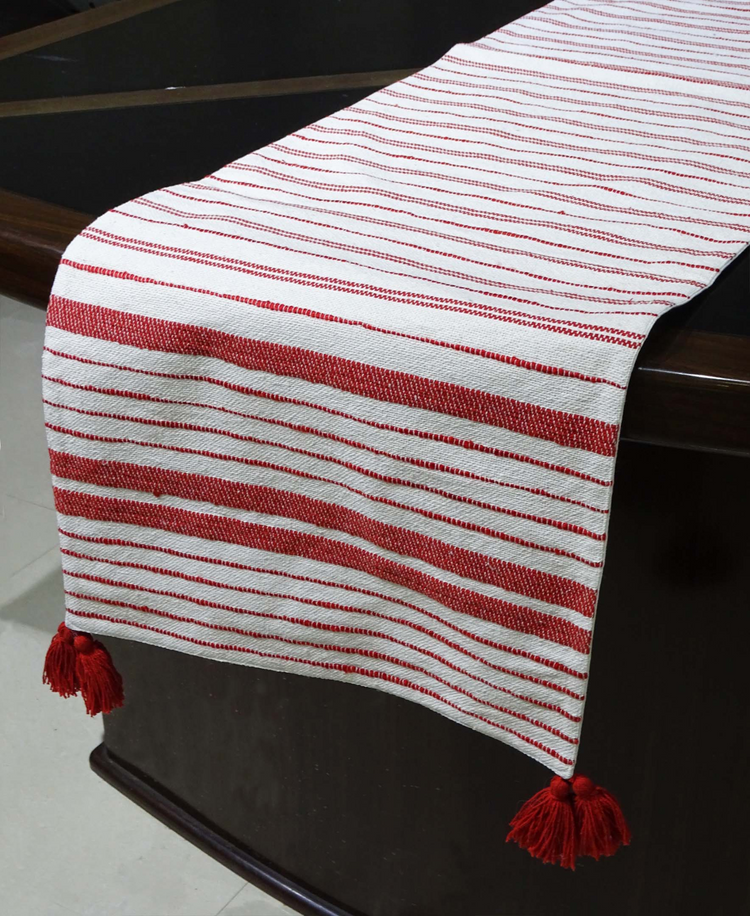 a red and white striped table runner