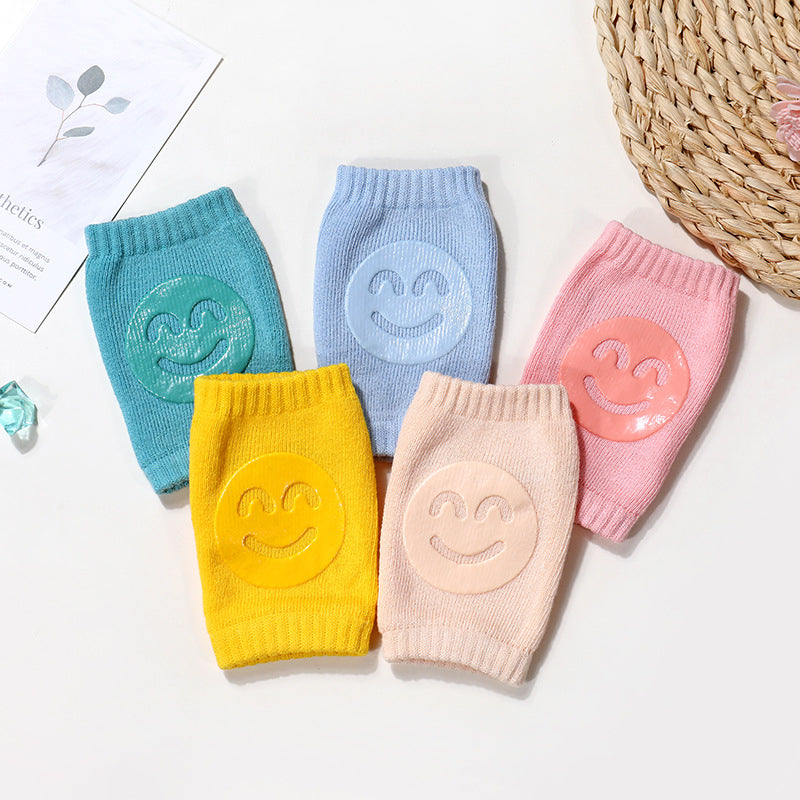 a group of colorful socks with smiley faces on them