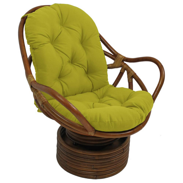 a green cushioned chair