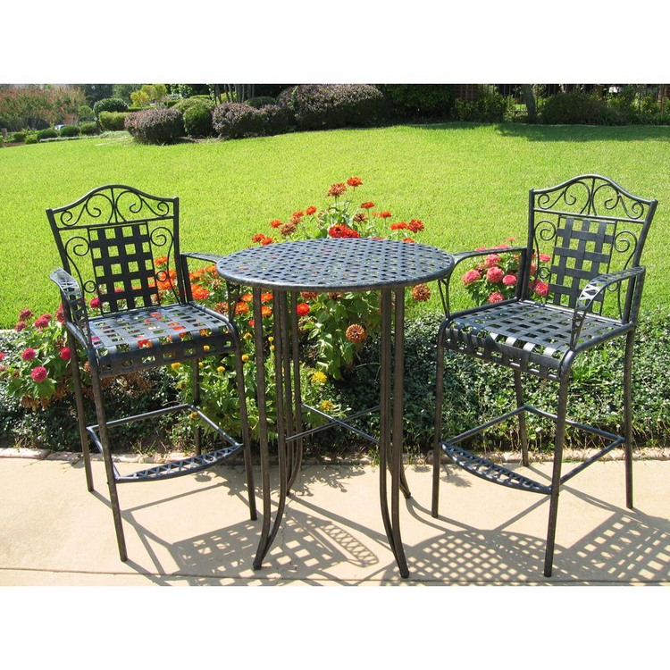 a table and chairs in a garden