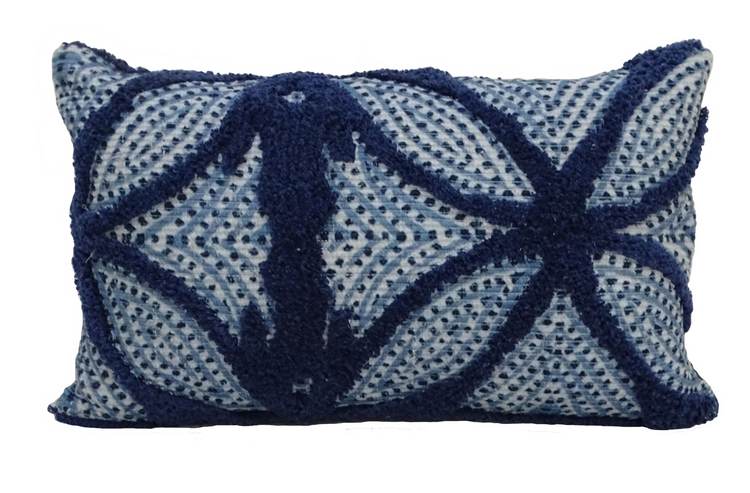 a blue and white pillow