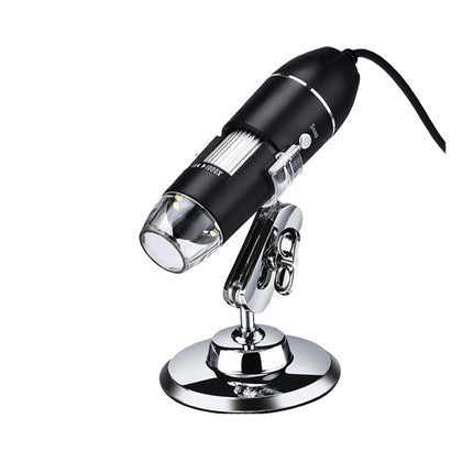a black and silver microscope