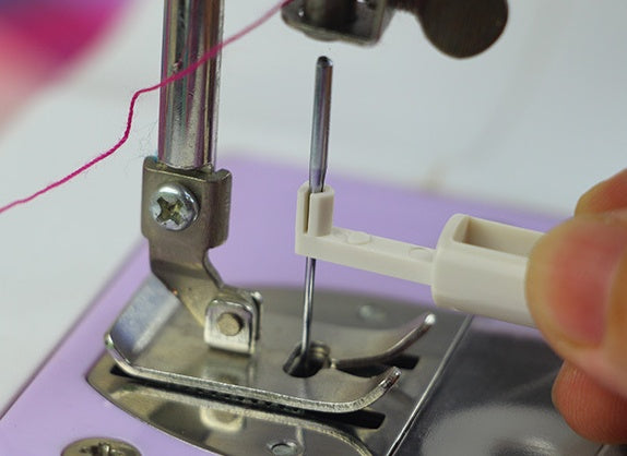 a close up of a sewing machine