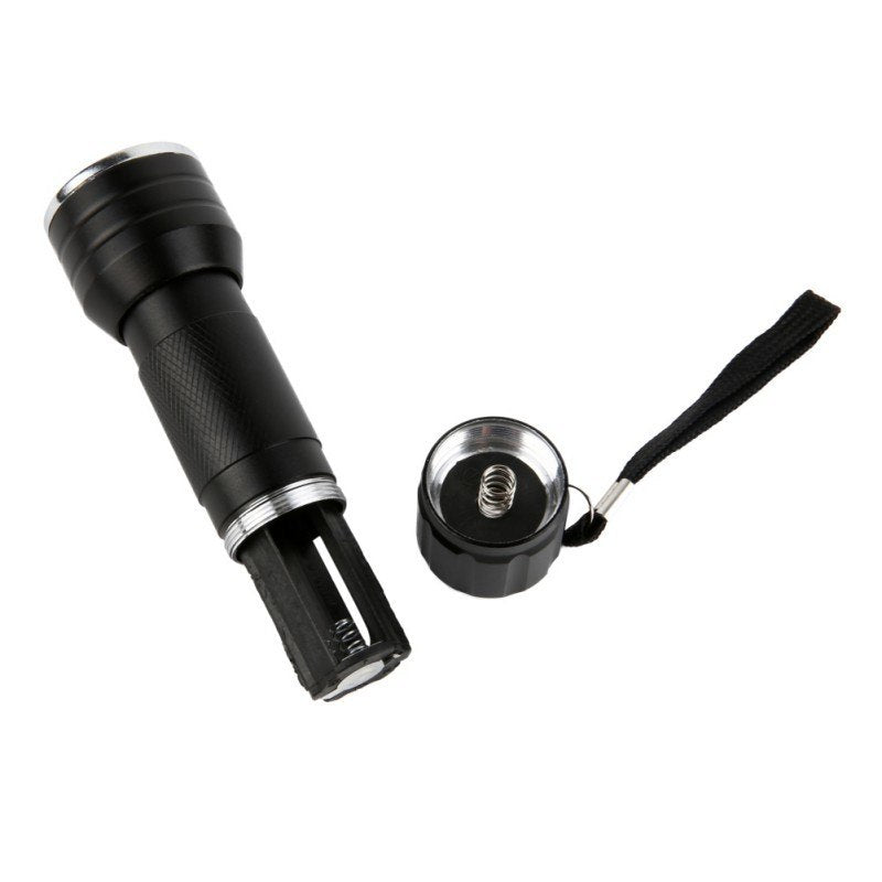a black flashlight with a black strap