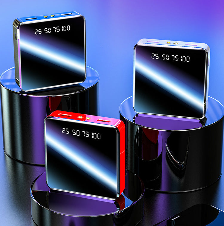 a group of black rectangular objects on a black surface