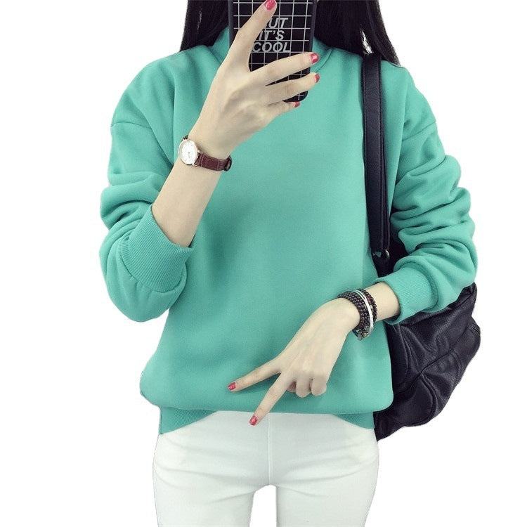 a woman holding a phone