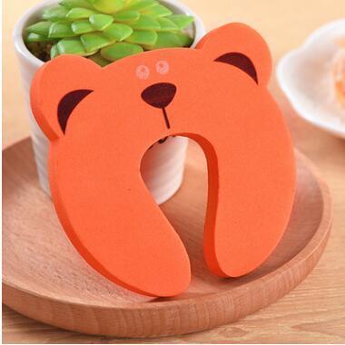 a pillow shaped like a bear