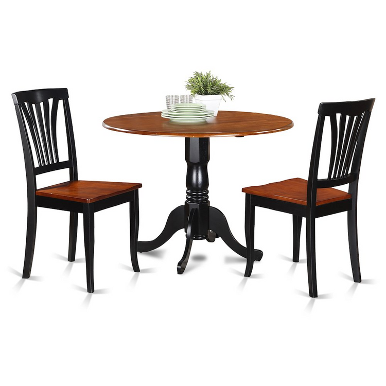 a table and chairs with a plant in the center