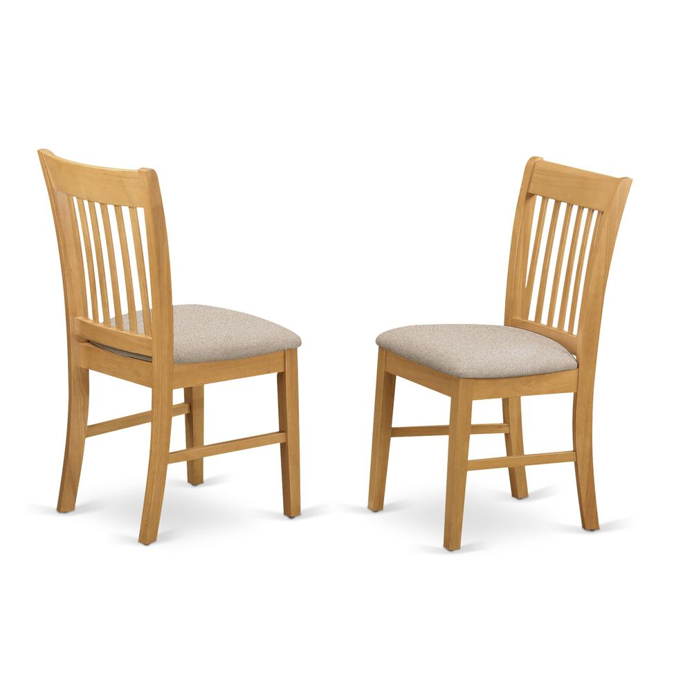 a pair of wooden chairs