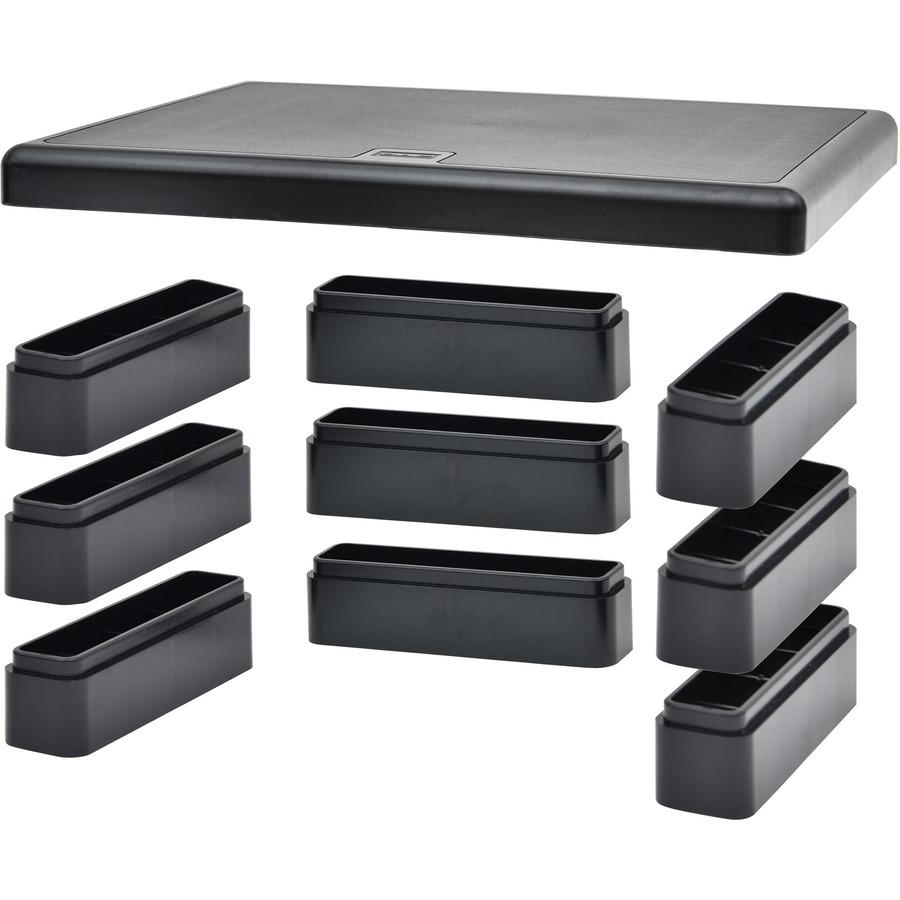 a black plastic drawer with several compartments