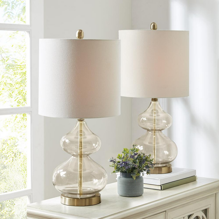 a two lamps on a table
