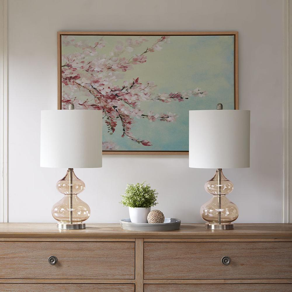 a table with two lamps on it