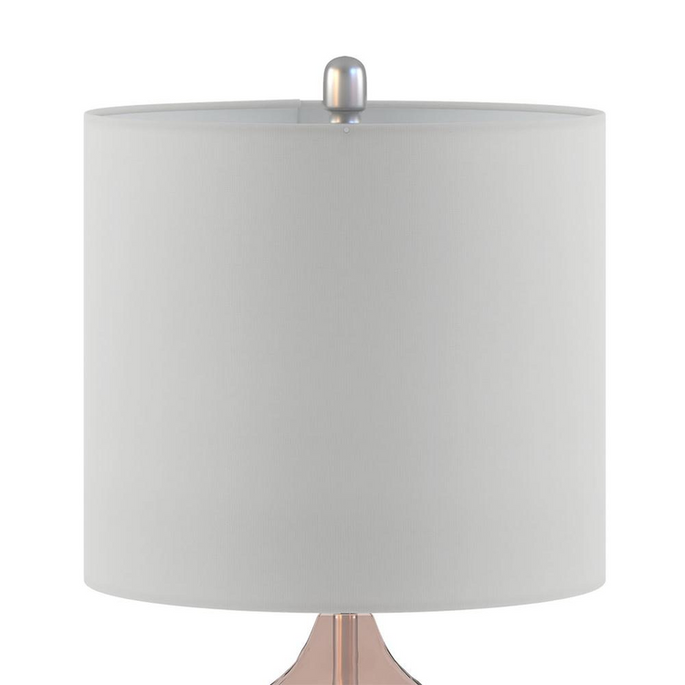 a white lamp shade with a pink base