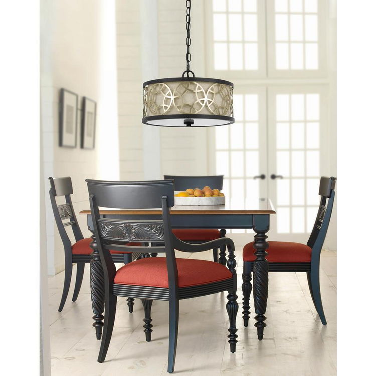 a dining table with chairs and a chandelier