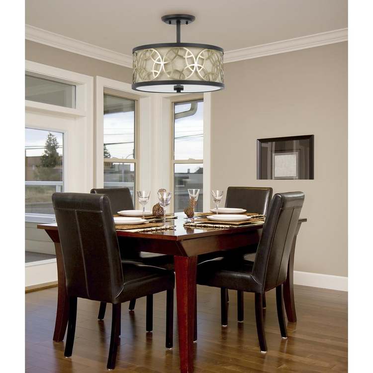 a dining table with a chandelier